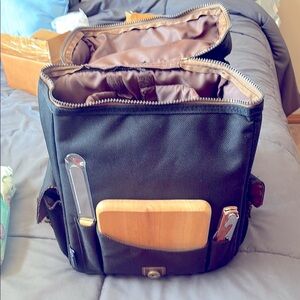 Legacy Black and Brown Cheese and Wine backpack. Brand New no tags.